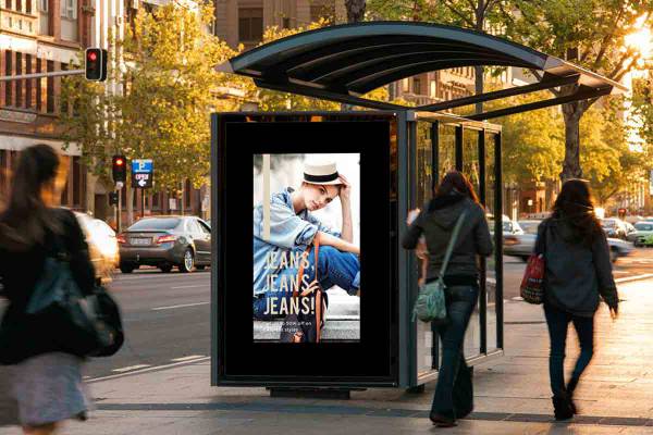 AG Neovo large format display is set up at the bus stop