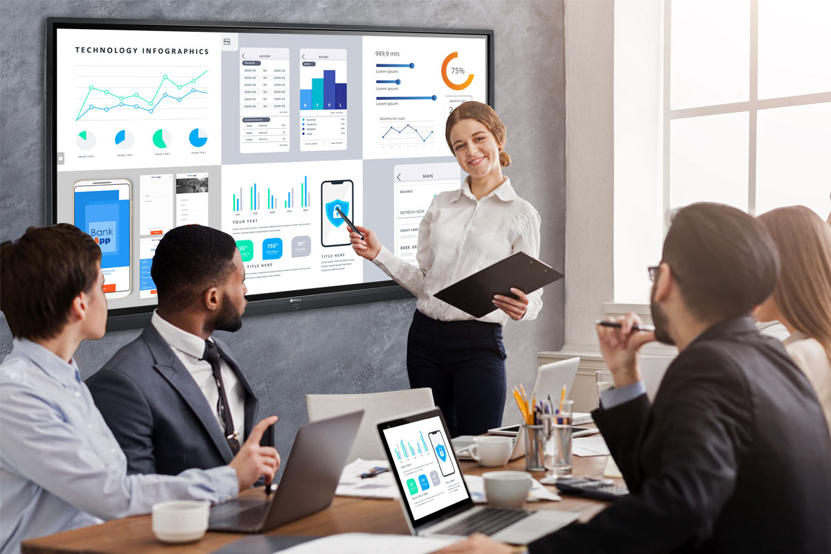 A group of people use screen mirroring through Meetboard IFP-series interacitve display in a huddle room